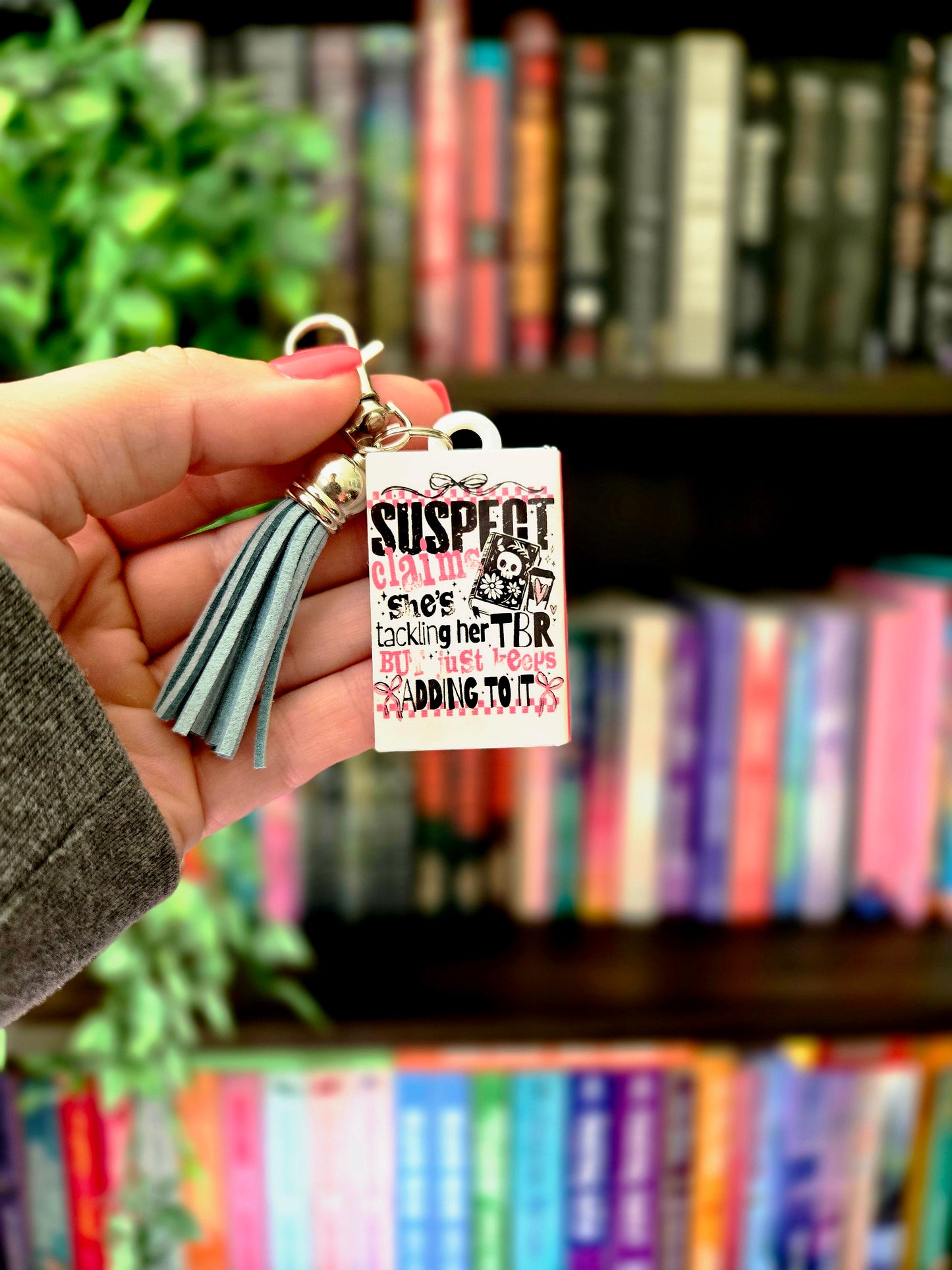 Suspect Book Keychain