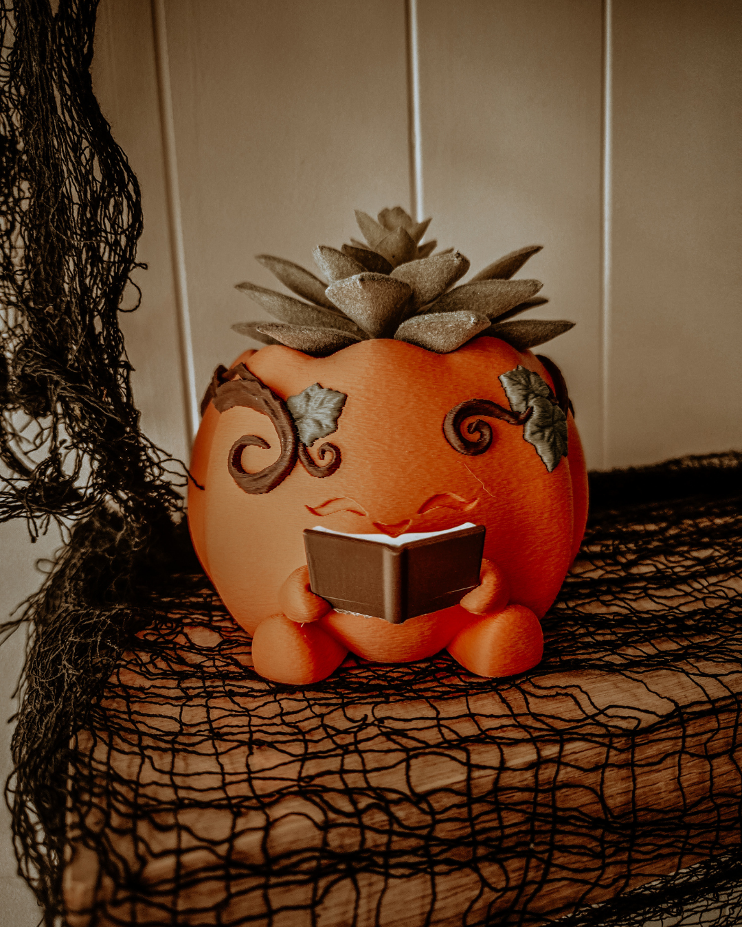 Reading Pumpkin Faux Plant Planter
