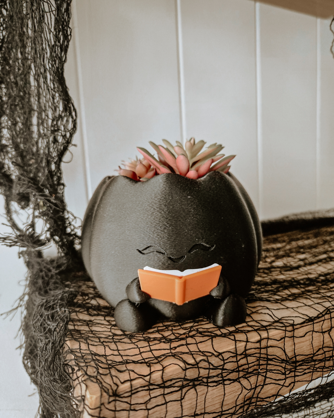 Reading Pumpkin Faux Plant Planter